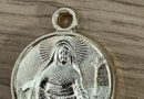 Why do Catholics wear medals of saints?